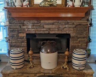 Pair of vintage etched glass lighted lusters, pair of McCoy #221 white vases, pair of vintage Staffordshire cats, hand-carved gilt wood fish, pair of bleu/white striped earthenware beverage crocks, pair of vintage French brass andirons, copper kindling holder and large stoneware glazed threshing jug double-handled crock.