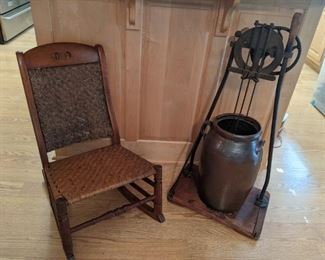 Antique child's rocker, w/woven seat and back and vintage glazed earthenware butter churn, w/churn stand.