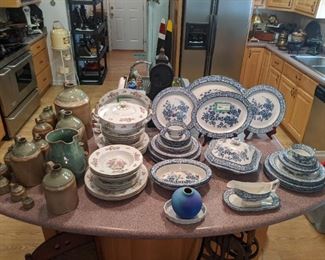 12-piece set of graduated glazed earthenware jugs (2006) and 3-D floral pitcher, by Emerson, GA artist, Ronnie Payne, 44-piece set of Wood's Ware blue & white "Wincanton" china, England and 25-piece set of vintage Noritake "China Peony", discontinued in 1952.