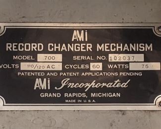 Manufacturers plate for the AMI jukebox "700" model.