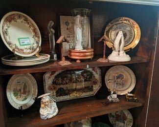 Religious shrine in the kitchen cupboard.
