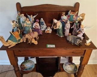 Here it is!                                                                                                Just in time for the slide into the holidays - a 22-piece set of hand-painted porcelain Nativity set, by Lenox, wooden creche included ( on bottom shelf beneath).