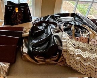Designer bags, some faux, some not