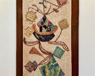 Hand embroidered tapestry/textile by Libby Karasik.