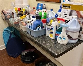 Lots of laundry items including a Shark steamer new in box and Roomba