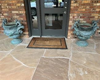 Large pair of French bronze cherub and lions head garden urns