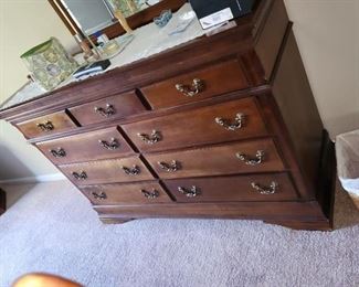 Couple spots on top. 58 long x 19 deep x 39 tall, long dresser with mirror, by Sumter. $285