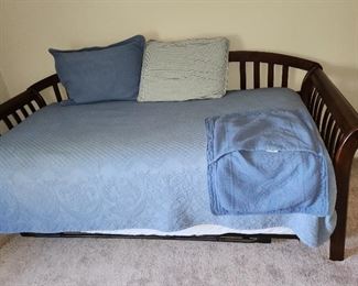 Solid wood trundle bed, rarely used. 84 wide x 39 deep. $225, with both mattresses