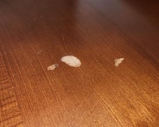 Spots on top of long dresser