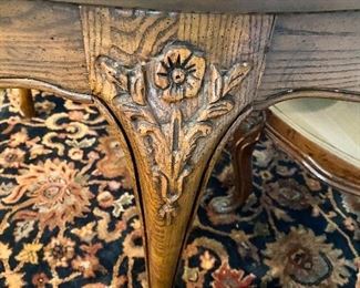 Additional photo of dining table carved leg.