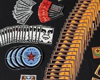 Assorted OBEY Giant stickers, Shepard Fairey
