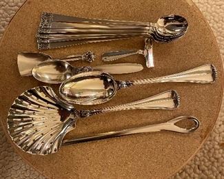 Tiffany Sterling Peretti Letter Opener, Buccelati Pierced Server and Tablespoon, Georg Jensen Tea Scoop and Teaspoon, Tiffany Sterling Food Pusher, and 6 Stancampiano “Donatello” Sterling Ice Tea Spoons 