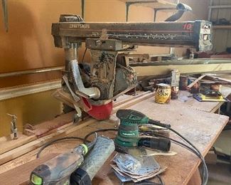 Radial arm saw, sanders, wood, and other tools.