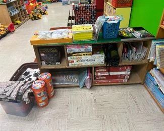 Board games like Operation, Scrabble, Matching and Memory games. Battleship board game. Card games and flash cards. Monopoly. Game of Life. Elementary board games. Chutes and Ladders. Bingo games. Foam dominoes. Ants in the Pants. Huge tic tac toe games. Jenga.