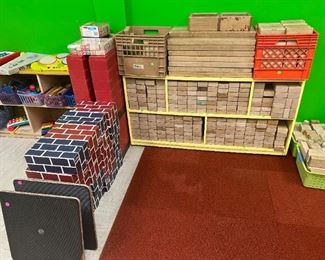 Wooden blocks. Large plastic blocks and large cardboard blocks. Balance Boards for elementary kids. Music toys for kids in far left of picture.