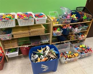 Manipulatives. Animals and people for doll houses and trucks and cars. Pretend people and animals. Mcdonalds toys. unopened and opened. Pegboards. Train sets.