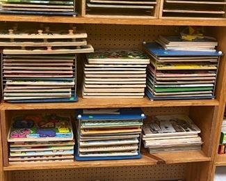 Puzzles. wooden and cardboard. Puzzle shelfs