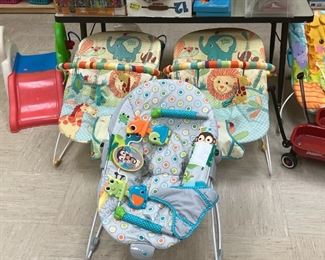 Baby bouncy seats. Toddler mini slides. Mini red ryder wagon