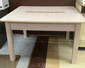 Large multi-person desk with center cord organizer