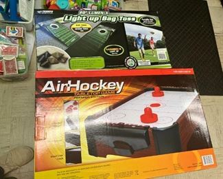 Air hockey and bag toss