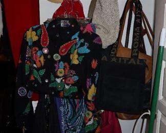 Lots of Ladies Designer Clothes - Sizes XS - S - M . Lots of Purses and Handbags as well.