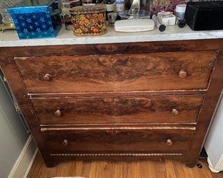 Antique mahogany chest with marble top