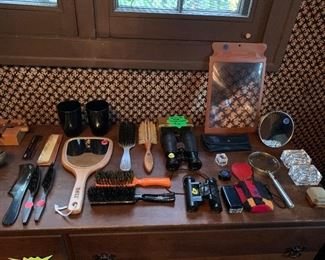 Binoculars, magnifiers, and KENT of England hair grooming items