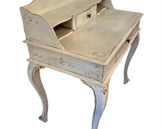 $500 - French Hand Painted White Wood Writing Desk CD131-35 Description: Vintage French painted writing desk with single drawer and cubby standing on cabriole legs. The piece also features painted trailing acanthus on the skirt and two drawers.
Condition: Used in very good vintage condition.
Dimensions: 33 x 20 x 36"H
Local pick up Leesburg, VA. Contact us for shipper suggestions.