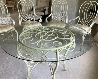 $750 - Vintage Antique White Scrolled Wrought Iron Dining Set CD131-57 Description: A beautiful 1950's wrought iron dining set. Beautifully made with heavy wrought iron and wonderful details. The set contains a round glass top table, and four armchairs with upholstered seats. Original antique white finish. Set was kept indoors and remains in very good condition.
Condition: Very good vintage condition.
Dimensions: 44 x 44 x 28 in
Local pick up Leesburg, VA. Contact us for shipper suggestions.