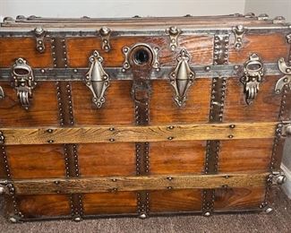 Bench Flat Top  A unique trunk. Created for the laid-back office, beautiful and comfy. The outside has been totally redone to a gorgeous finish and rustic hardware.

The inside is open except for the cushion that has been custom fitted. Thanks to my friends at Made By Missy in Fayetteville, NC.

*Please note we can ship this item although it is marked pickup only, just know there will be additional costs.

34L x 21D x 24H