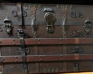 Flat Top Trunk Featuring Corbin Lock
This is a very nice canvas covered flat top trunk. The canvas is in real good shape. Leather straps and handles would be all that is needed to restore the outside. It has a Corbin Lock with a replacement key # of 6ST. It also has Charles Taylor latches and other hardware. The inside has a tray that lifts as the lid is opened. It also has a pocket for your important papers. 

*Please note we can ship this item although it is marked pickup only, just know there will be additional costs.

34L x 21D x 24