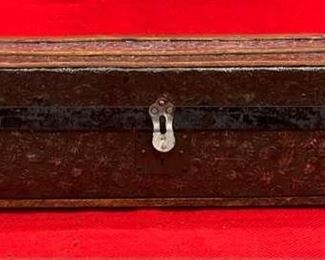 Sample Trunk Featuring Pressed Acorn Tin
This is a unique trunk with rare, pressed acorn tin that was patented and introduced in 1880s. The outside acorn tin, wood slats, and hardware are in great condition along with the rollers on the bottom that was unusual on the Childs or Sample trunks. The inside is in fair condition ready to be restored. Truly a rare find for anyone.

*Please note we can ship this item although it is marked pickup only, just know there will be additional costs.

20 x 10D x 6H