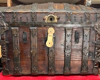 Camel Back Manufactured In Atlanta
A real history piece. This is an Abe Foote and Brothers trunk manufactured in Atlanta Ga. This trunk could date back within 12 or 15 years after Atlanta burned. It’s amazing what could be produced that soon after such a disaster. Much of the hinges and hardware looks to be from John Sessions, one of the most well-known trunk hardware manufacturers back then. A real piece of history.

*Please note we can ship this item although it is marked pickup only, just know there will be additional costs.

33L x 20D x 25H