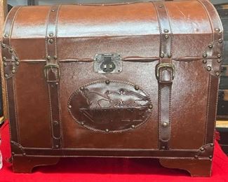 Leather Covered National Wild Turkey Foundation Box
This is NOT an antique trunk. This is a wooden box covered with leather and was made expressly for National Wild Turkey Foundation in Edgefield, SC.

*Please note we can ship this item although it is marked pickup only, just know there will be additional costs. 

24L x 16D x 20