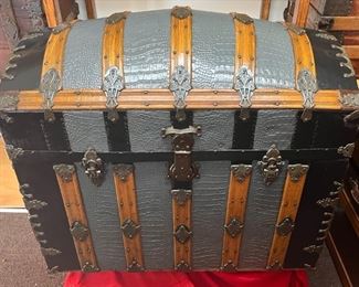 Alligator Stamped Camel Back
This is a very well built, large, grey alligator stamped Camel Back. It has John H. Sessions hardware along with rare #4 Charles Taylor latches, an Eagle lock with a replacement key #29. This trunk is large enough to fit all your Afghan’s and blankets.

*Please note we can ship this item although it is marked pickup only, just know there will be additional costs.

36L x 21D x 32H