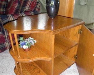 This side table not only looks amazing, but offers tons of hidden storage too!