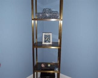 Large stately brass and glass display shelves