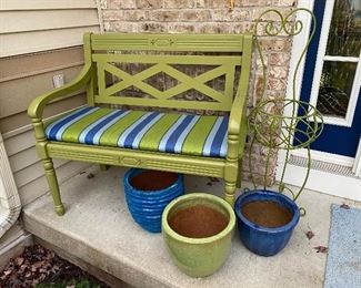 Outdoor bench, lots of great pottery planters
