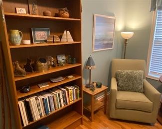 6-shelf Bookcase, Books, Décor, Braided Oval Rug, Small Side Table and Armchair