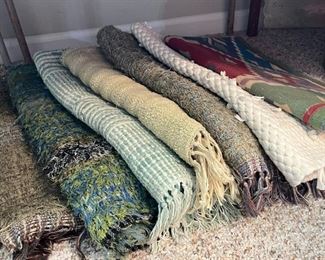 Assortment of throws rugs