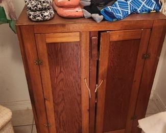 primitive wooden cabinet, slippers