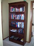 Bookcase sold. Books still available.