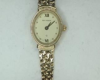 14K Gold Bucherer Watch. Case and band 14K