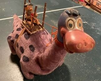 Vintage 1960's Marx Flintstone on Dino Battery Toy.