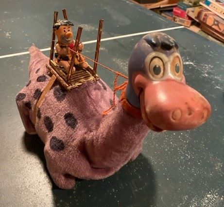 Vintage 1960's Marx Flintstone on Dino Battery Toy.