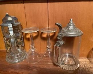 Beer steins and cocktail glasses.