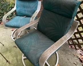 Swivel patio chairs.