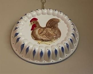Ceramic rooster mold.
