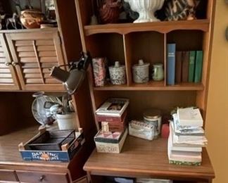 Pair of bookshelves with decorative accessories.