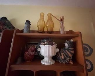 Pair of bookshelves with decorative accessories.